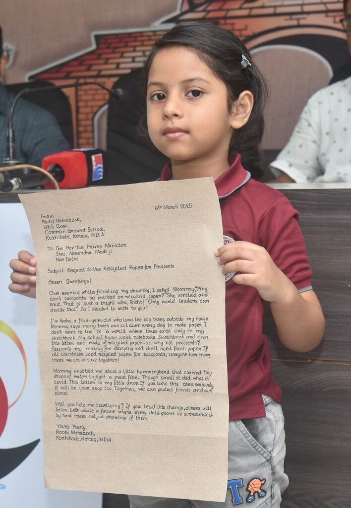 Five-year-old Roohi Mohazzab with her handwritten letter to Indian Prime Minister Narendra Modi 