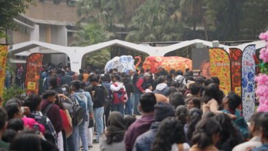 Spectators queue for the exhibition