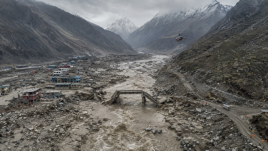 Nepal floods 2026 showing severe destruction in a Himalayan river valley, damaged bridges, debris and rescue operations